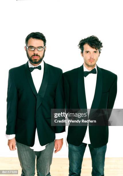 Photo of Bret McKENZIE and FLIGHT OF THE CONCHORDS and Jemaine CLEMENT; Posed studio group portrait of Jemaine Clement and Bret McKenzie