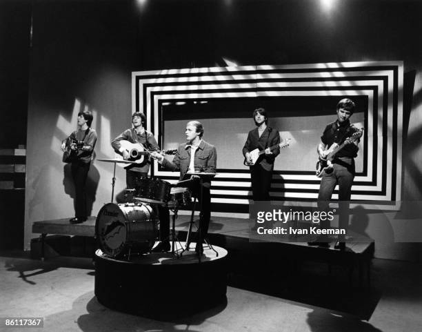 English pop and rock group the Hollies on stage performing the song 'Bus Stop' on the set of the Associated Rediffusion Television pop music...