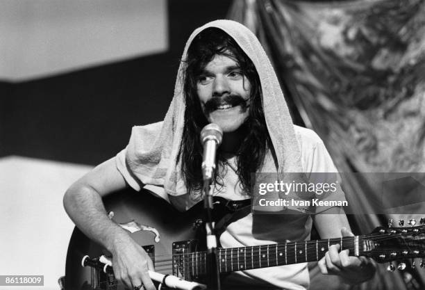 Singer and guitarist Roy Wood on stage with British rock group The Move performing the song 'Curly' on the set of the BBC Television pop music...