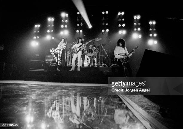 Photo of Brian MAY and Roger TAYLOR and Freddie MERCURY and QUEEN; L - R: Freddie Mercury, John Deacon, Roger Taylor and Brian May performing live on...