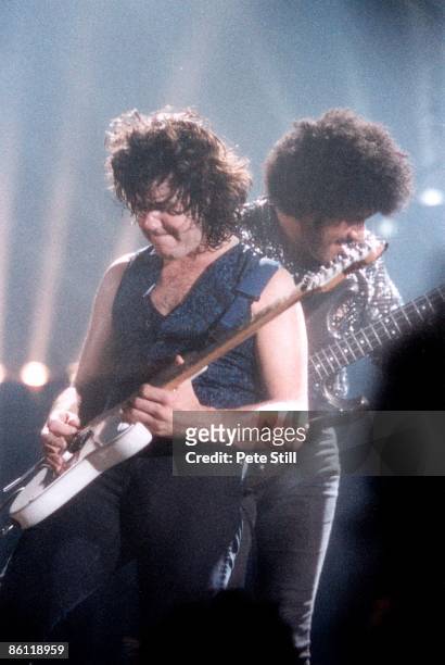 Photo of Gary MOORE and Phil LYNOTT, Phil Lynott with Gary Moore band performing live onstage