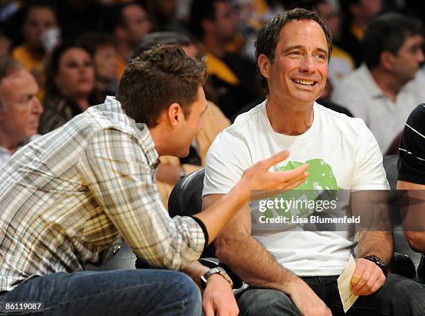 Personalities Ryan Seacrest and TMZ's Harvey Levin talk from their courtside seats during the Los Angeles Lakers and Utah Jazz Game One of the...