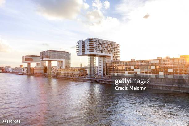 crane houses at river rhine - cologne, north rhine-westphalia, germany - cologne stock pictures, royalty-free photos & images
