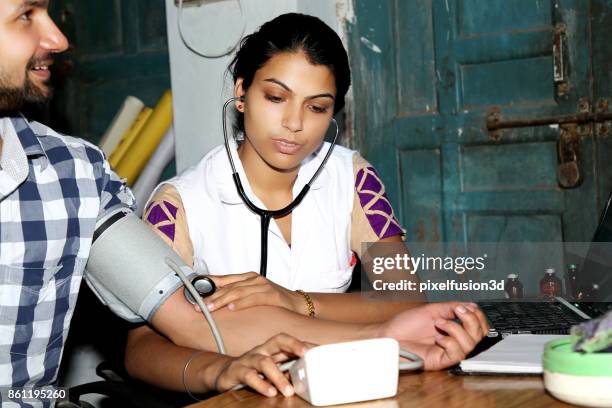 female doctor examine the patient - primary care stock pictures, royalty-free photos & images
