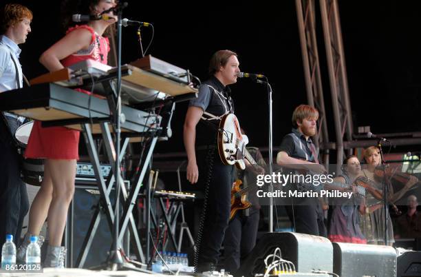 Photo of ARCADE FIRE, L-R: Richard Reed Parry, Regine Chassagne, Win Butler, Tim Kingsbury performing live onstage at Flemington Racecourse