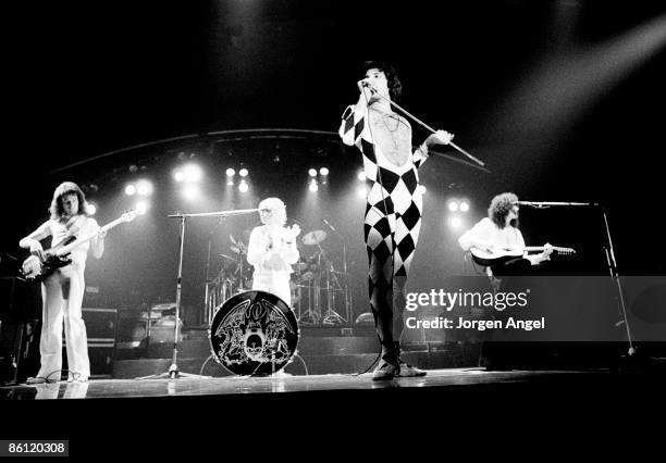 Photo of Brian MAY and QUEEN and Freddie MERCURY and Roger TAYLOR; L-R. John Deacon, Roger Taylor, Freddie Mercury and Brian May performing live on...