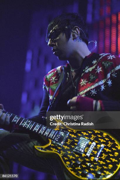 Photo of Zacky VENGEANCE and AVENGED SEVENFOLD; Zacky Vengeance performing on stage at the KROQ Almost Acoustic Christmas concert held at the Gibson...