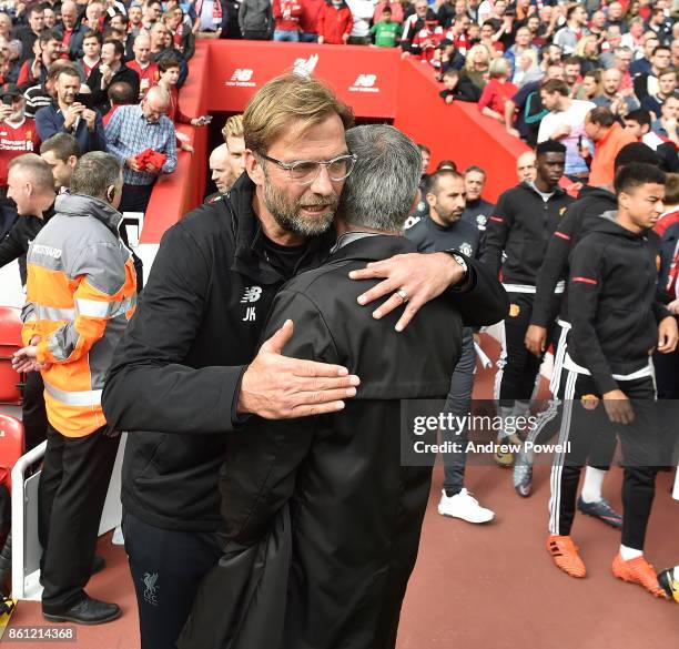 Jurgen Klopp Manager of Liverpool with Jose Mourinho Manager Manchester United during the Premier League match between Liverpool and Manchester...