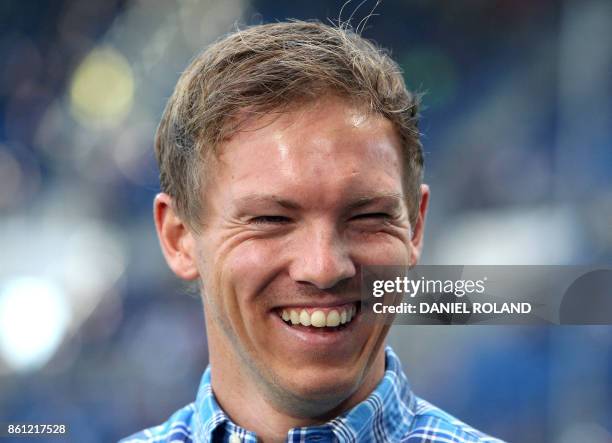 Hoffenheim's German head coach Julian Nagelsmann smiles prior to the German first division Bundesliga football match TSG 1899 Hoffenheim vs FC...