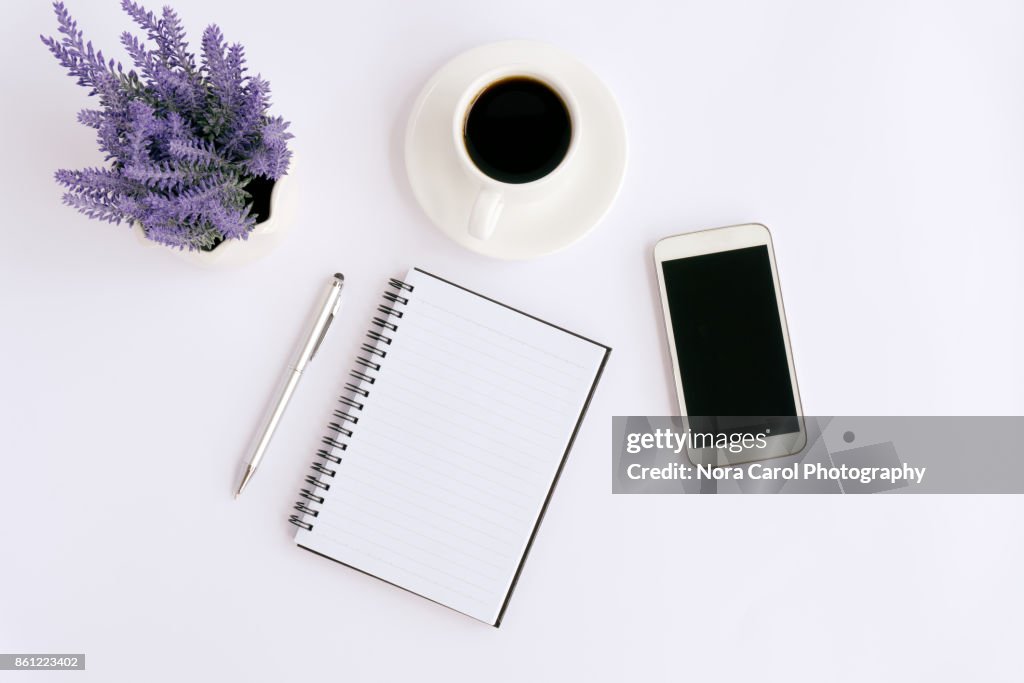 Simple Business Table with Mock Up Office Supplies and Smartphoneon White