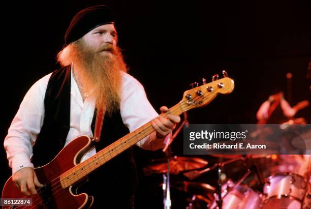 Photo of Dusty HILL and ZZ TOP, Dusty Hill performing live onstage, playing Fender Precision bass