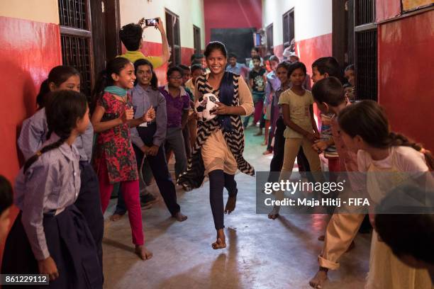 Children in "Maxvision Social welfare Society" play games during the visit of "Feeding India" volunteers ahead of the FIFA U-17 World Cup India 2017...