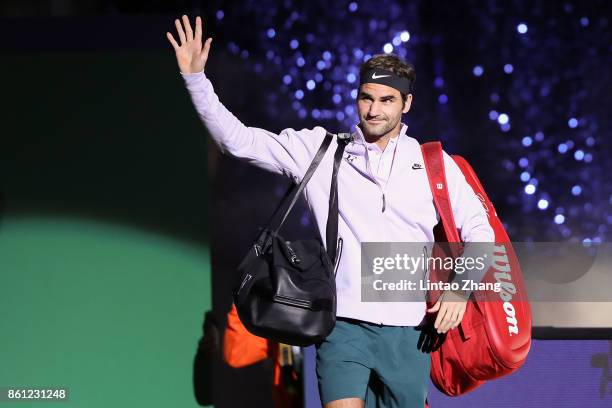 Roger Federer of Switzerland enters the tennis court during the Men's singles Semifinal mach against Juan Martin del Potro of Argentina on day seven...