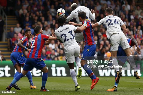 Chelsea's French midfielder Tiemoue Bakayoko jumps to haed Chelsea's first goal during the English Premier League football match between Crystal...