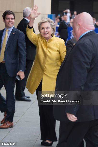 Hillary Clinton waves as she arrives at Swansea University where she is to be given a Honorary Doctorate of Law on October 14, 2017 in Swansea,...