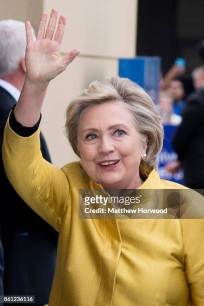 Hillary Clinton waves as she arrives at Swansea University where she is to be given a Honorary Doctorate of Law on October 14, 2017 in Swansea,...