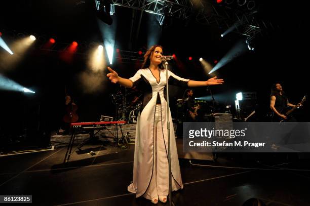 Photo of Tarja TURUNEN, Tarja Turunen performing on stage, full length