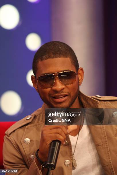 Photo of USHER; Usher during a press conference for the BET Awards