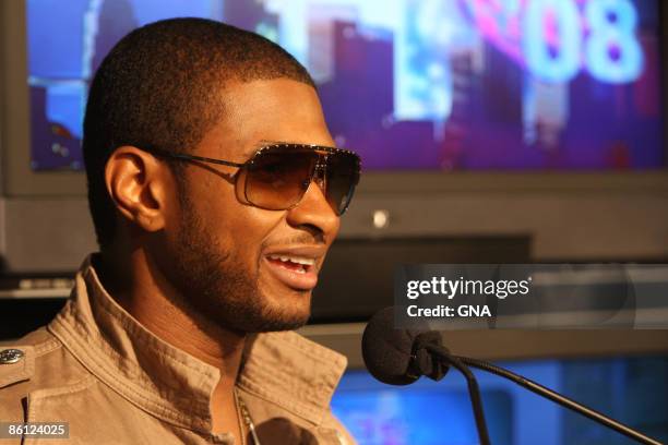 Photo of USHER; Usher during a press conference for the BET Awards, portrait