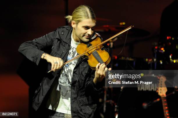 Photo of David GARRETT, Violinist David Garrett performing on stage