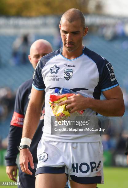 Dublin , Ireland - 14 October 2017; Ruan Pienaar of Montpellier, leaves the pitch with a packet of Tayto, given to him by Ulster supporters,...