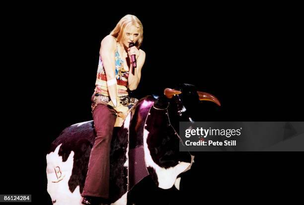 Madonna performs on stage on a bucking bronco on her Drowned World Tour, Earls Court, London, 12th July 2001.