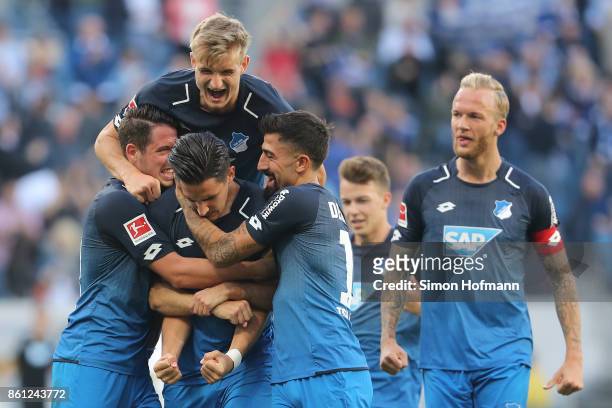Benjamin Huebner of Hoffenheim celebrates after he scored his teams first goal to make it 1:0 during the Bundesliga match between TSG 1899 Hoffenheim...