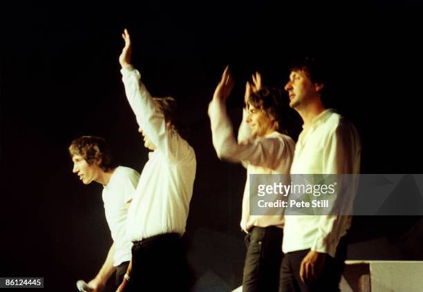 Photo of PINK FLOYD, L to R: Roger Waters, Dave Gilmour , Rick Wright, Nick Mason - waving to crowd, group shot, onstage atThe Wall concert