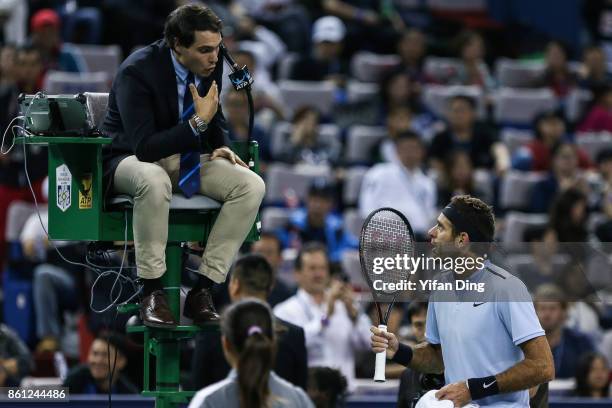 Juan Martin del Potro of Argentina argues with the chair during the Men's singles semi-final match against Roger Federer of Switzerland on day 7 of...