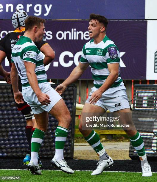 Adam Radwan of Newcastle Falcons celebrates scoring a try in the first half with team mate Sam Stuart during the European Rugby Challenge Cup match...
