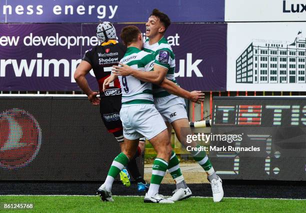 Adam Radwan of Newcastle Falcons celebrates scoring a try in the first half with team mate Sam Stuart during the European Rugby Challenge Cup match...