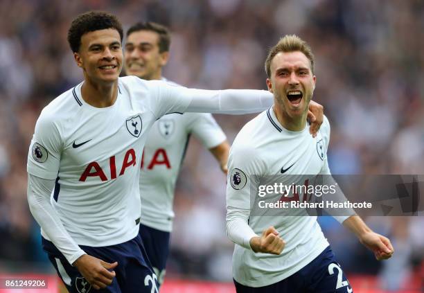 Christian Eriksen of Tottenham Hotspur celebrates scoring his sides first goal with Dele Alli of Totteham Hotspur during the Premier League match...