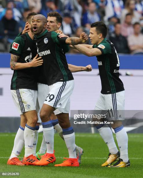 Guido Burgstaller of Schalke jubilates with team mates after scoring the second goal during the Bundesliga match between Hertha BSC and FC Schalke 04...