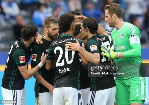 Guido Burgstaller of Schalke jubilates with team mates after scoring the second goal during the Bundesliga match between Hertha BSC and FC Schalke 04...