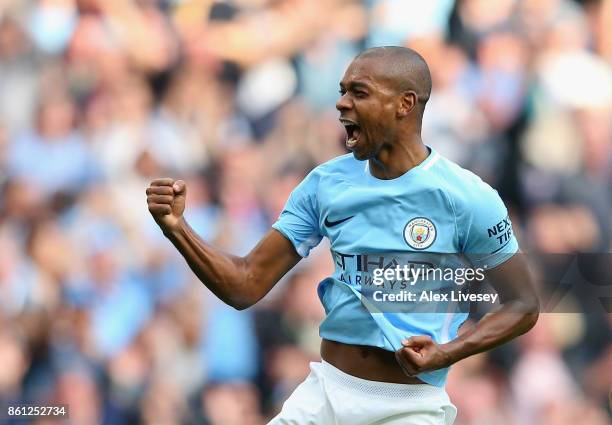 Fernandinho of Manchester City celebrates scoring his sides fifth goal during the Premier League match between Manchester City and Stoke City at...