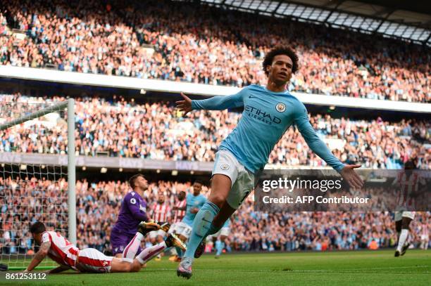Manchester City's German midfielder Leroy Sane celebrates scoring their sixth goal during the English Premier League football match between...
