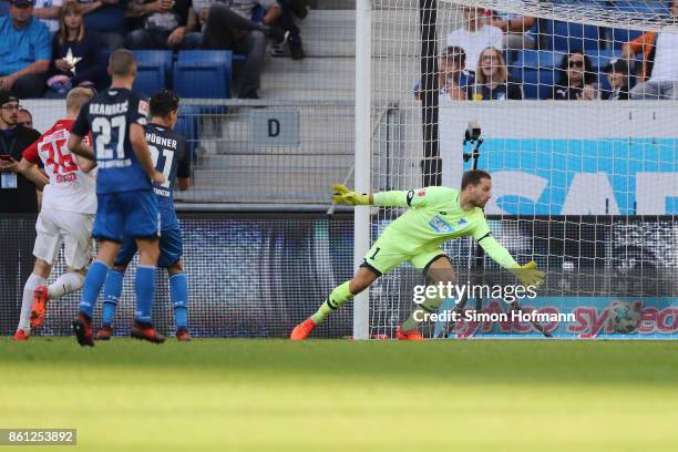 Oliver Baumann of Hoffenheim can't save an own goal by Kevin Vogt of Hoffenheim to make it 2:2 during the Bundesliga match between TSG 1899...
