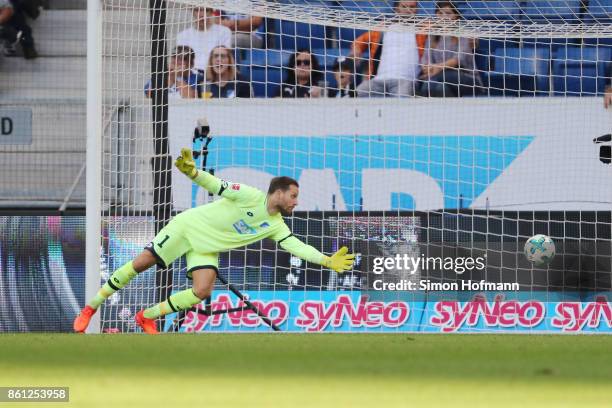 Oliver Baumann of Hoffenheim can't save an own goal by Kevin Vogt of Hoffenheim to make it 2:2 during the Bundesliga match between TSG 1899...