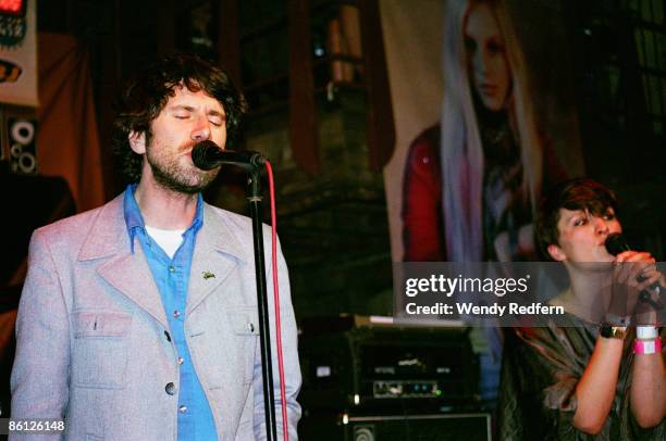 Photo of NEON NEON and Gruff RHYS, Gruff Rhys performing on stage at the Cedar Street Courtyard as part of the SXSW Festival