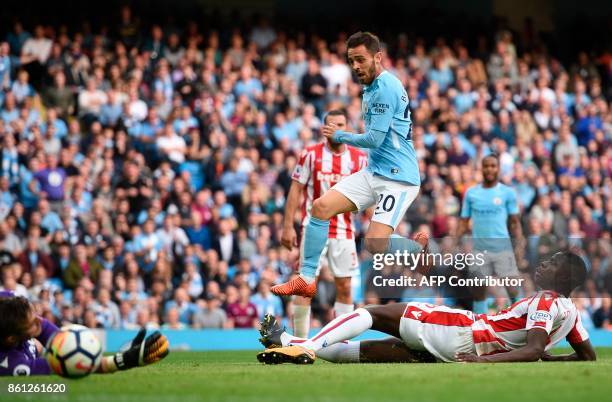Manchester City's Portuguese midfielder Bernardo Silva scores their seventh goal during the English Premier League football match between Manchester...