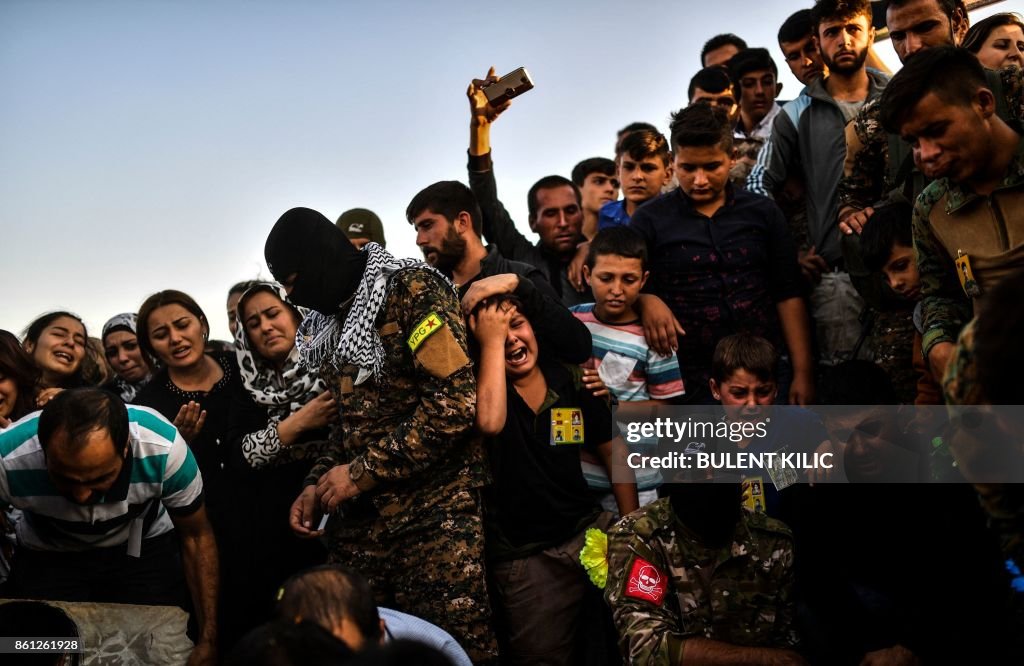 TOPSHOT-SYRIA-CONFLICT-RAQA