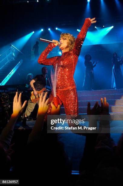 Photo of Jeanette BIEDERMANN; Jeanette Biedermann performing on stage at the Circus Krone