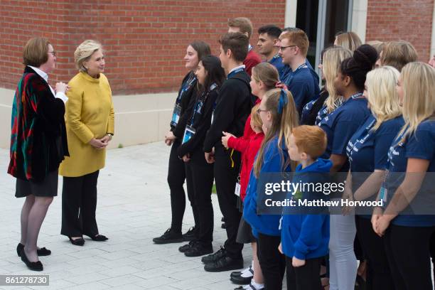 Hillary Clinton meets schoolchildren from Swansea and Narberth at Swansea University where she was given a Honorary Doctorate of Laws at Swansea...