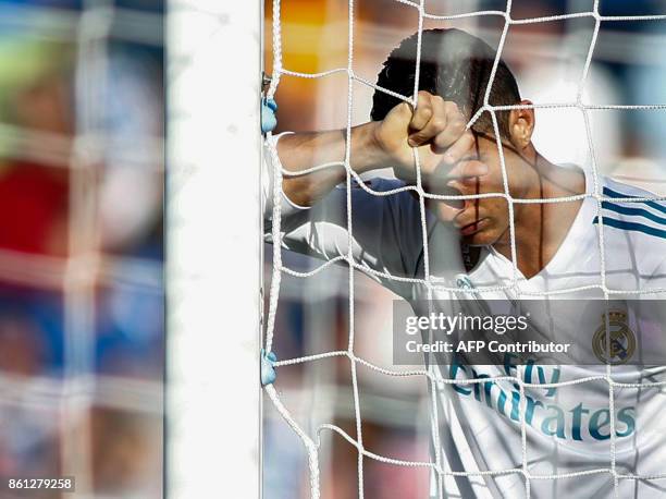 Real Madrid's Portuguese forward Cristiano Ronaldo gestures during the Spanish league football match Getafe CF vs Real Madrid CF at the Col. Alfonso...