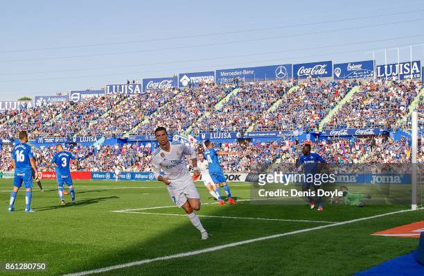 Cristiano Ronaldo of Real Madrid CF celebrates after scoring his team's 2nd goal during the La Liga match between Getafe and Real Madrid at Coliseum...
