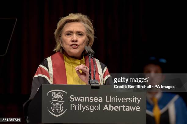 Hillary Clinton gives a speech as she receives a Honorary Doctorate, at Swansea University, in recognition of her commitment to promoting the rights...