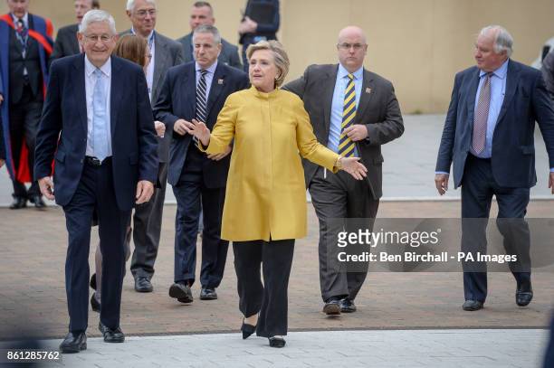 Hillary Clinton walks around the campus, as she receives a Honorary Doctorate, at Swansea University, in recognition of her commitment to promoting...