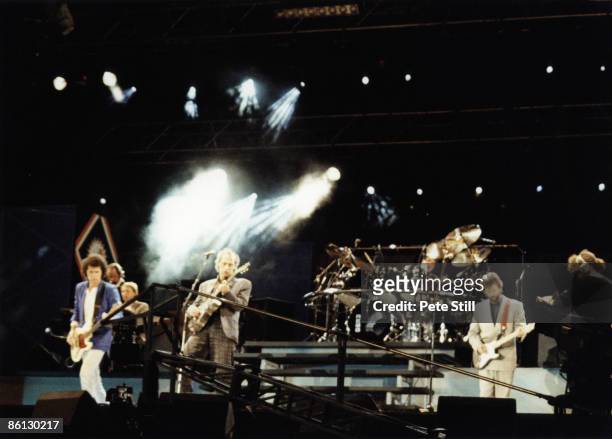 Photo of DIRE STRAITS and Mark KNOPFLER and Eric CLAPTON, Mark Knopfler and Eric Clapton performing on stage at the Nelson Mandela 70th Birthday...