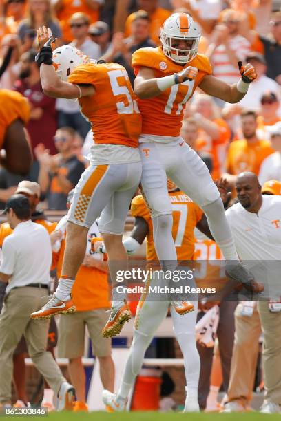 Dillon Bates of the Tennessee Volunteers celebrates with Colton Jumper against the South Carolina Gamecocks during the first half at Neyland Stadium...