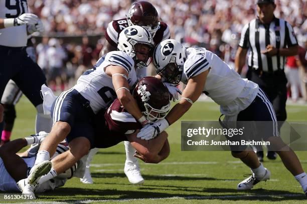 Nick Fitzgerald of the Mississippi State Bulldogs scores a touchdown during the first half of a game against the Brigham Young Cougars at Davis Wade...